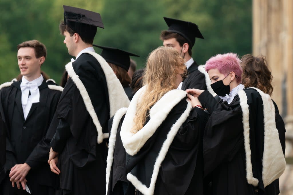 Universities in England can charge up to £9,250 per year for an undergraduate degree (PA) (PA Wire)