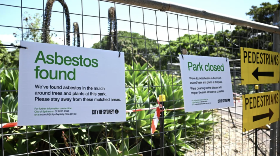 A Sydney park with signage detailing its exposure to asbestos. 