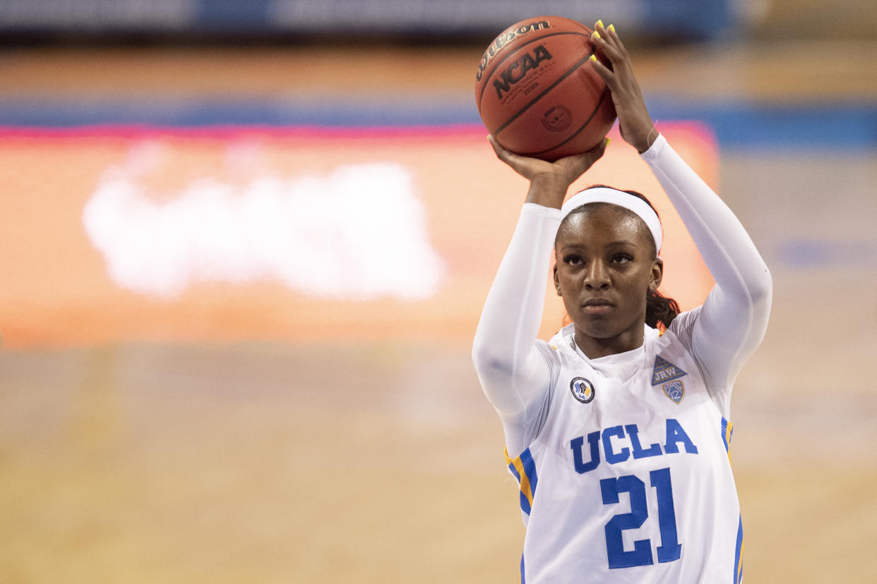 Michaela Onyenwere shoots the ball during a game.