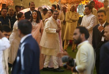 Mukesh Ambani (C), Chairman of Reliance Industries Mukesh Ambani, in seen during his daughter Isha Ambani's wedding ceremony in Mumbai, India, December 12, 2018. REUTERS/Francis Mascarenhas