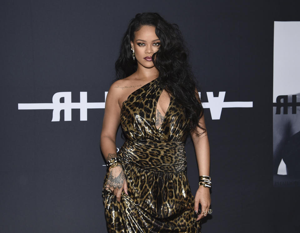 FILE - Singer and fashion designer Rihanna attends the "Rihanna" book launch event in New York on Oct. 11, 2019. It's been four years since Rihanna released an album but the singer is working hard on recording new music. The pop star, 32, told The Associated Press for her new album she's already held “tons of writing camps" — where songwriters are put into groups to create original tracks for artists. (Photo by Evan Agostini/Invision/AP, File)