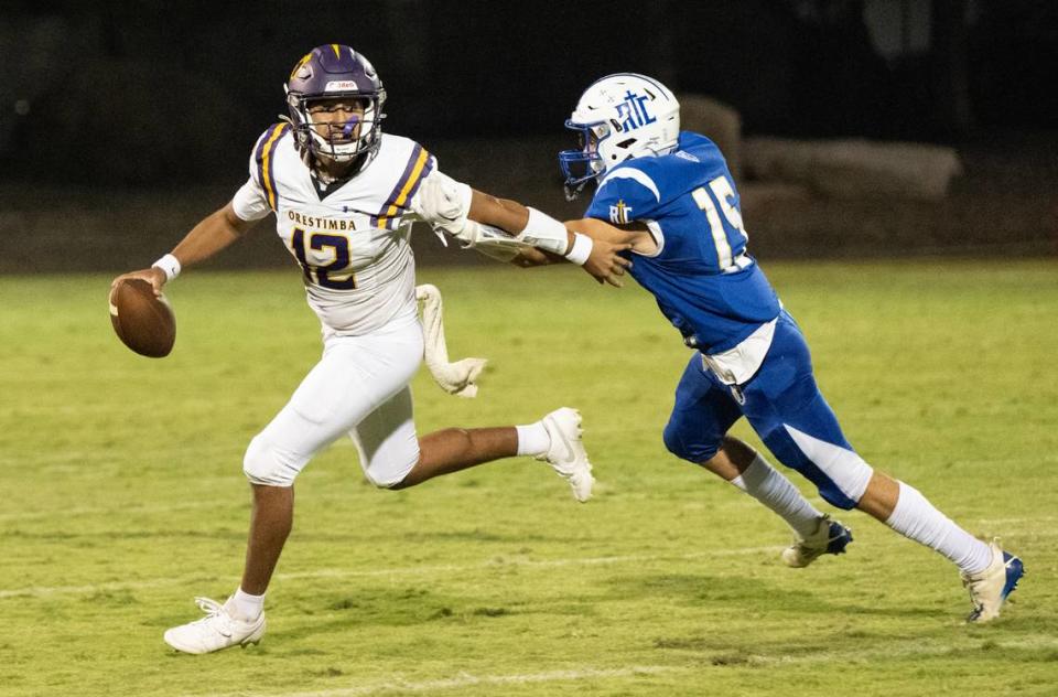 Ripon Christian’s Josh Miller pressures Orestimba quarterback Jacob Valenzuela during the Southern League game in Ripon, Calif., Friday, Sept. 22, 2023.