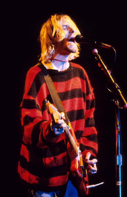 <p>No punk wardrobe is complete without a moth-bitten sweater (see also: John Lydon, Mark E. Smith). Cobain went super London ’77 with his choice of one in mohair stripe.</p><p><i>Photo: Getty</i></p>