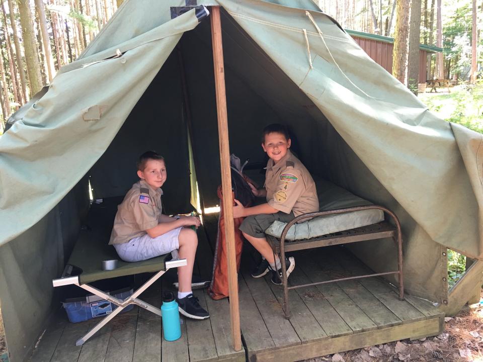 Gavin Smith (right) is pictured in his Boy Scouts of America uniform.