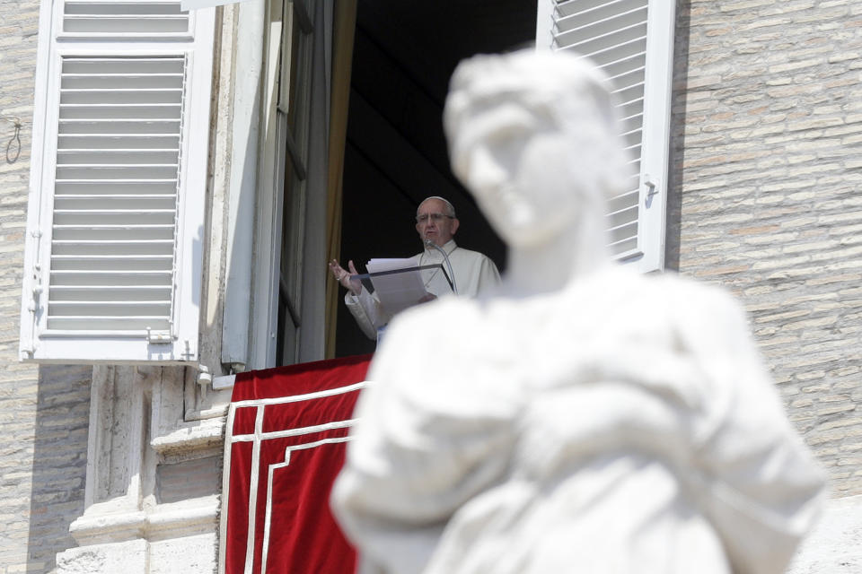 Pope Francis delivers his message from his studio window overlooking St. Peter's Square during the Angelus noon prayer at the Vatican, Sunday, July 29, 2018. (AP Photo/Gregorio Borgia)