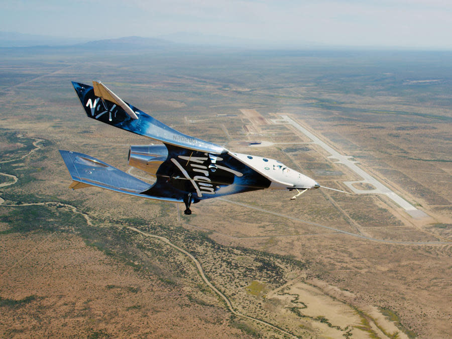 The VSS Unity on a gliding approach to the 12,000-foot-long runway at Spaceport America near Truth or Consequences, New Mexico. The company is an anchor tenant at the state-funded facility. / Credit: Virgin Galactic