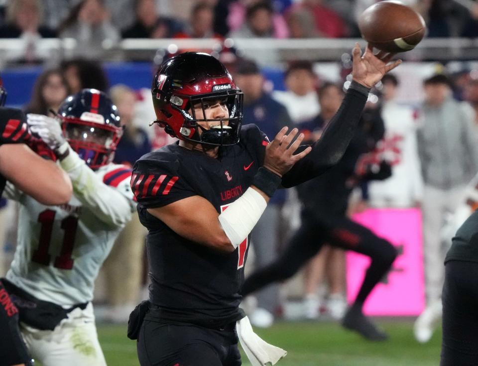 Liberty quarterback Navi Bruzon throws the ball against Centennial during their Open Division State Championship game at Mountain America Stadium in Tempe on Dec. 2, 2023.