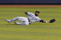 Tampa Bay Rays right fielder Manuel Margot is unable to catch a ball hit by Miami Marlins' Jonathan Villar for a single during the first inning of a baseball game Saturday, Aug. 29, 2020, in Miami. (AP Photo/Wilfredo Lee)