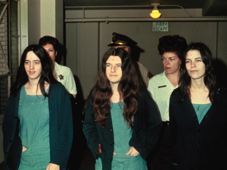 Susan Atkins, Patricia Krenwinkle, and Leslie Van Houton enter court in 1969 (Bettmann Archive)