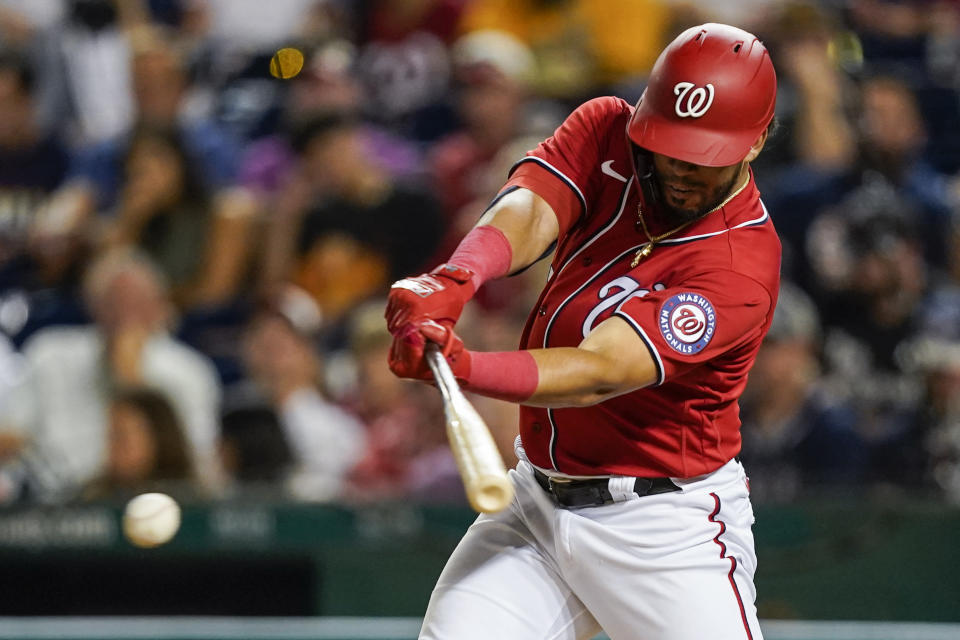 Washington Nationals' Luis Garcia hits an RBI single during the fifth inning of a baseball game against the Oakland Athletics at Nationals Park, Wednesday, Aug. 31, 2022, in Washington. (AP Photo/Alex Brandon)