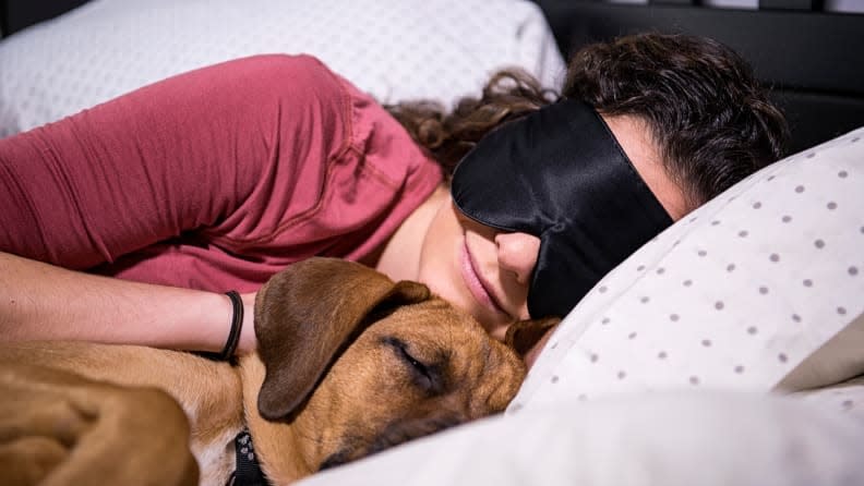 Sleeping in an airport might not be ideal, but a quality sleep mask can help.