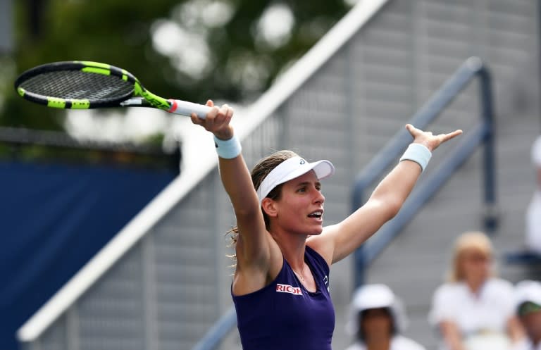 Johanna Konta of Great Britain hits a return against Tsvetana Pironkova of Bulgaria during their 2016 US Open Women’s Singles match at the US Open in New York on August 31, 2016