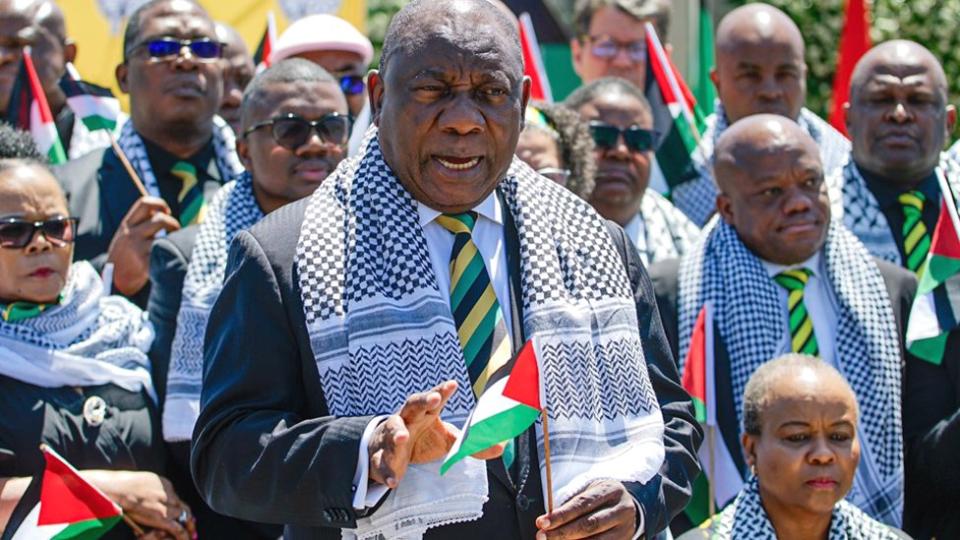 President Cyril Ramaphosa and ANC NEC members with Palestinian flags and each wearing a keffiyeh - October 14, 2023