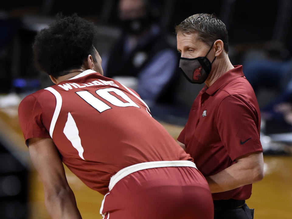 Arkansas head coach Eric Musselman talks with forward Jaylin Williams (10) during the first half of an NCAA college basketball game against Vanderbilt, Saturday, Jan. 23, 2021, in Nashville, Tenn. (AP Photo/Mark Zaleski)