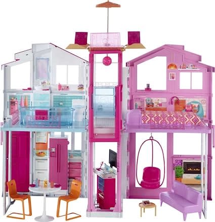 pink doll house with elevator and furniture