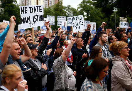 Hundreds of supporters holding placards and T-shirts reading "We have the evidence", "Do not give us the truth" are seen during protest in Sarajevo, Bosnia and Herzegovina May 15, 2018. REUTERS/Dado Ruvic