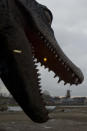 A life-size replica of a crocodile's mouth is suspended from the full scale replica of Noah's Ark which opened its doors in Doredrecht, Netherlands, Monday Dec. 10, 2012, after receiving permission to receive up to 3,000 visitors per day. (AP Photo/Peter Dejong)