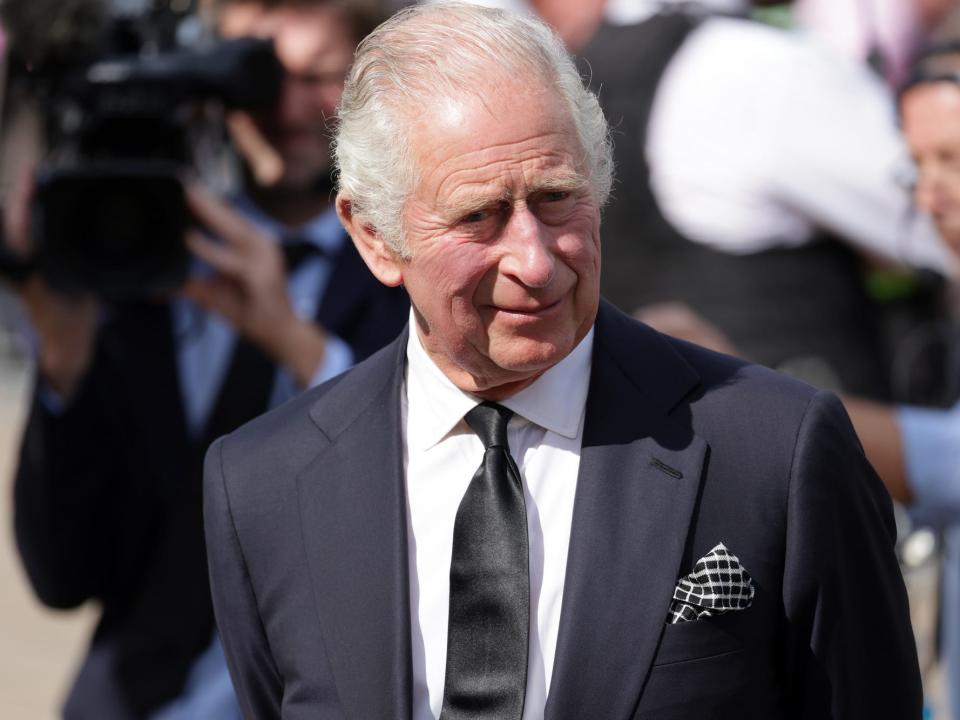 King Charles III in front of Buckingham Palace the day after Queen Elizabeth's death.