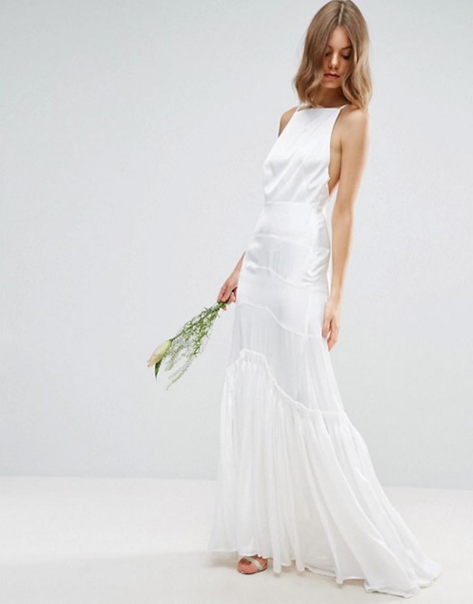 A model wears a white cami maxi dress from Asos