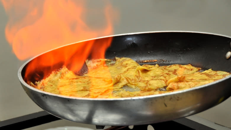 Crepes flambeed in pan