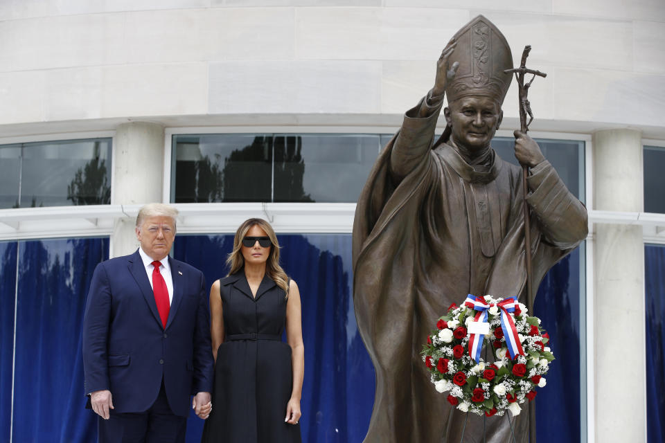 President Donald Trump and first lady Melania Trump visit Saint John Paul II National Shrine, Tuesday, June 2, 2020, in Washington. (AP Photo/Patrick Semansky)