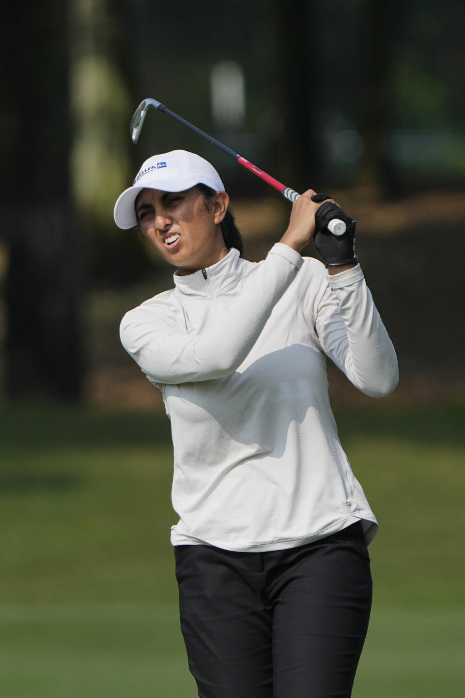 Aditi Ashok of India hits from the tee on the seventh hole during the second round of the LPGA Maybank Championship in Kuala Lumpur, Malaysia, Friday, Oct. 27, 2023. (AP Photo/Vincent Thian)