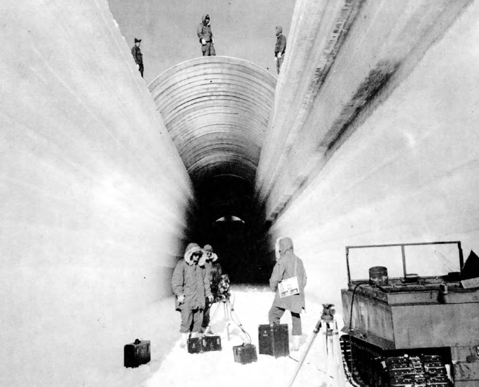 The Camp Century tunnels started as trenches cut into the ice. <a href="https://upload.wikimedia.org/wikipedia/commons/9/96/Camp_Century_trench_construction.png" rel="nofollow noopener" target="_blank" data-ylk="slk:U.S. Army Corps of Engineers;elm:context_link;itc:0;sec:content-canvas" class="link ">U.S. Army Corps of Engineers</a>