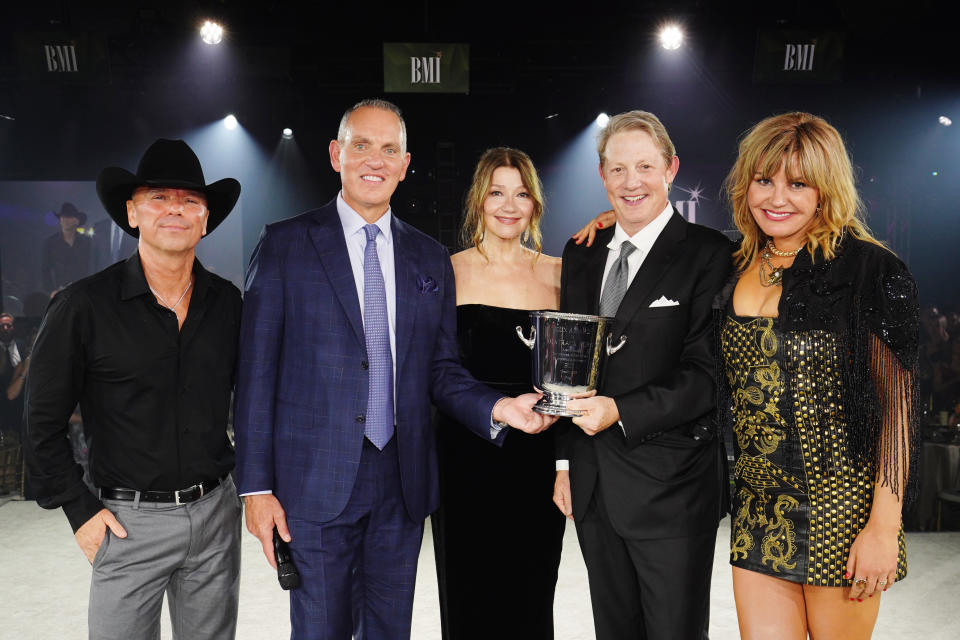 NASHVILLE, TENNESSEE - NOVEMBER 07: (L-R) Kenny Chesney, BMI President & CEO, Mike O'Neill, BMI Icon Award winner, Matraca Berg, BMI Vice President, Creative, Nashville, Clay Bradley and Grace Potter attend the 2023 BMI Country Awards at BMI Nashville on November 07, 2023 in Nashville, Tennessee. (Photo by Erika Goldring/Getty Images for BMI)