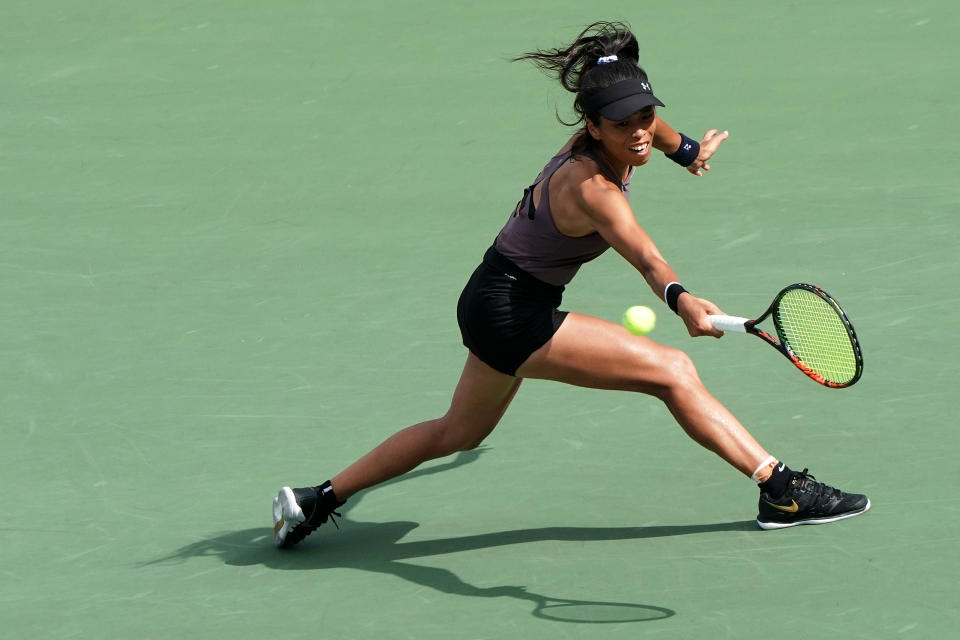 Su-Wei Hsieh of Chinese Taipei hits a return shot against against Garbine Muguruza of Spain during day two of the Toray Pan Pacific Open. (Photo by Koji Watanabe/Getty Images)