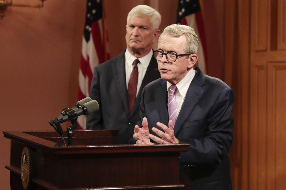 Ohio Gov. Mike DeWine, addresses Brian Garrett, not pictured, a sexual abuse survivor of Dr. Richard Strauss, during a press conference regarding a recent Ohio State University report about Dr. Richard Strauss on Monday, May 20, 2019 at the Ohio Statehouse in Columbus, Ohio. Strauss, a former athletic department and health-services physician, is accused of abusing 177 male students from 1979 to 1997, the details of which were recently revealed in an Ohio State report regarding Dr. Strauss. Strauss killed himself in 2005 about a decade after retiring from the university with honors. During the press conference, Gov. DeWine signed an executive order creating a committee to examine an unredacted version of the Ohio State report which contained confidential information from a 1996 State of Ohio Medical Board investigation into Strauss. DeWine also called on lawmakers to review the statue of limitations for misdemeanor and felony sex crimes.  Also pictured is Tom Stickrath, director of the Ohio Department of Public Safety. [Joshua A. Bickel/Dispatch]