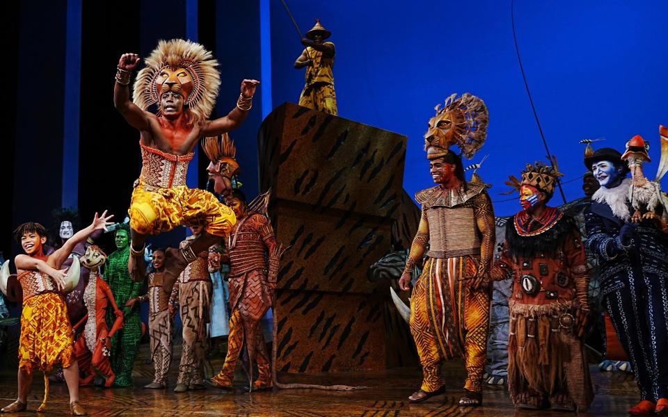 The Lion King cast in their first show back after the pandemic shutdown - AP/Charles Sykes