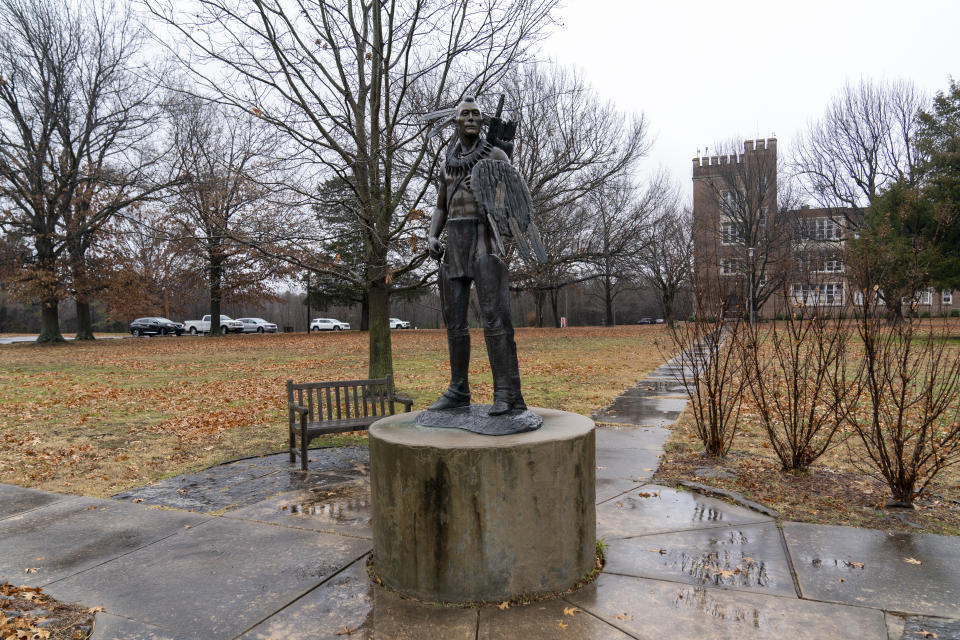 A statue of a Chickasaw warrior sits on display at Bacone College, on Jan. 8 2024, in Muskogee, Okla. Founded in 1880 as a Baptist missionary college focused on assimilation, Bacone College transformed into an Indigenous-led institution that provided an intertribal community, as well as a degree. (AP Photo/Nick Oxford)