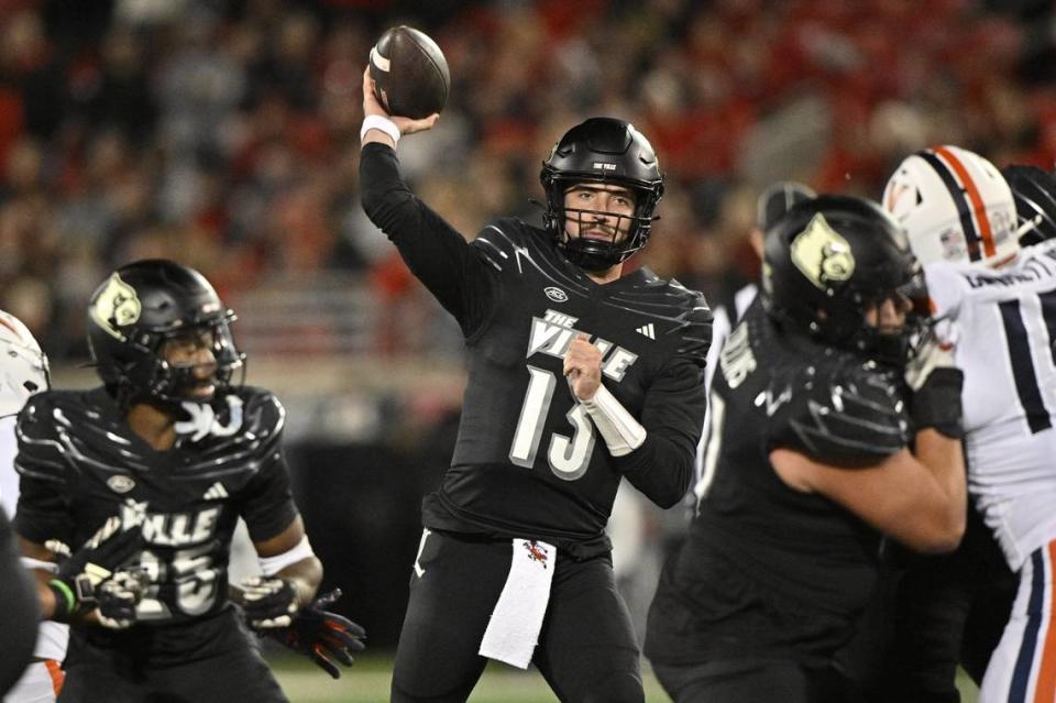 Louisville quarterback Jack Plummer (13) has thrown for 2,710 yards, completing 65.4 percent of his throws with 19 touchdowns vs. 10 interceptions.