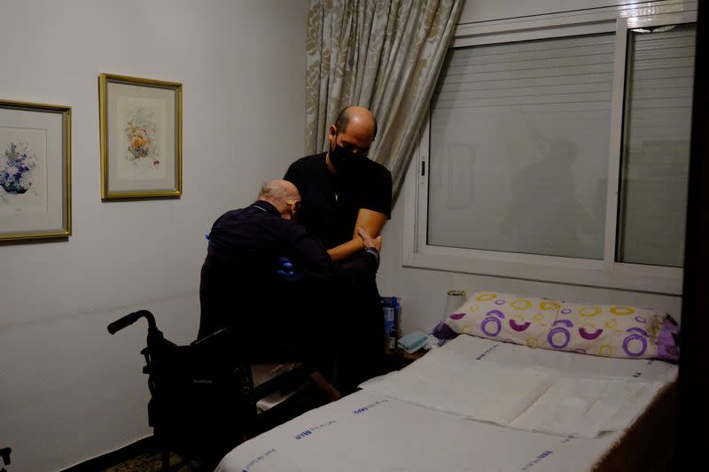 The Wider Image: High power prices drive some patients in Spain into poverty