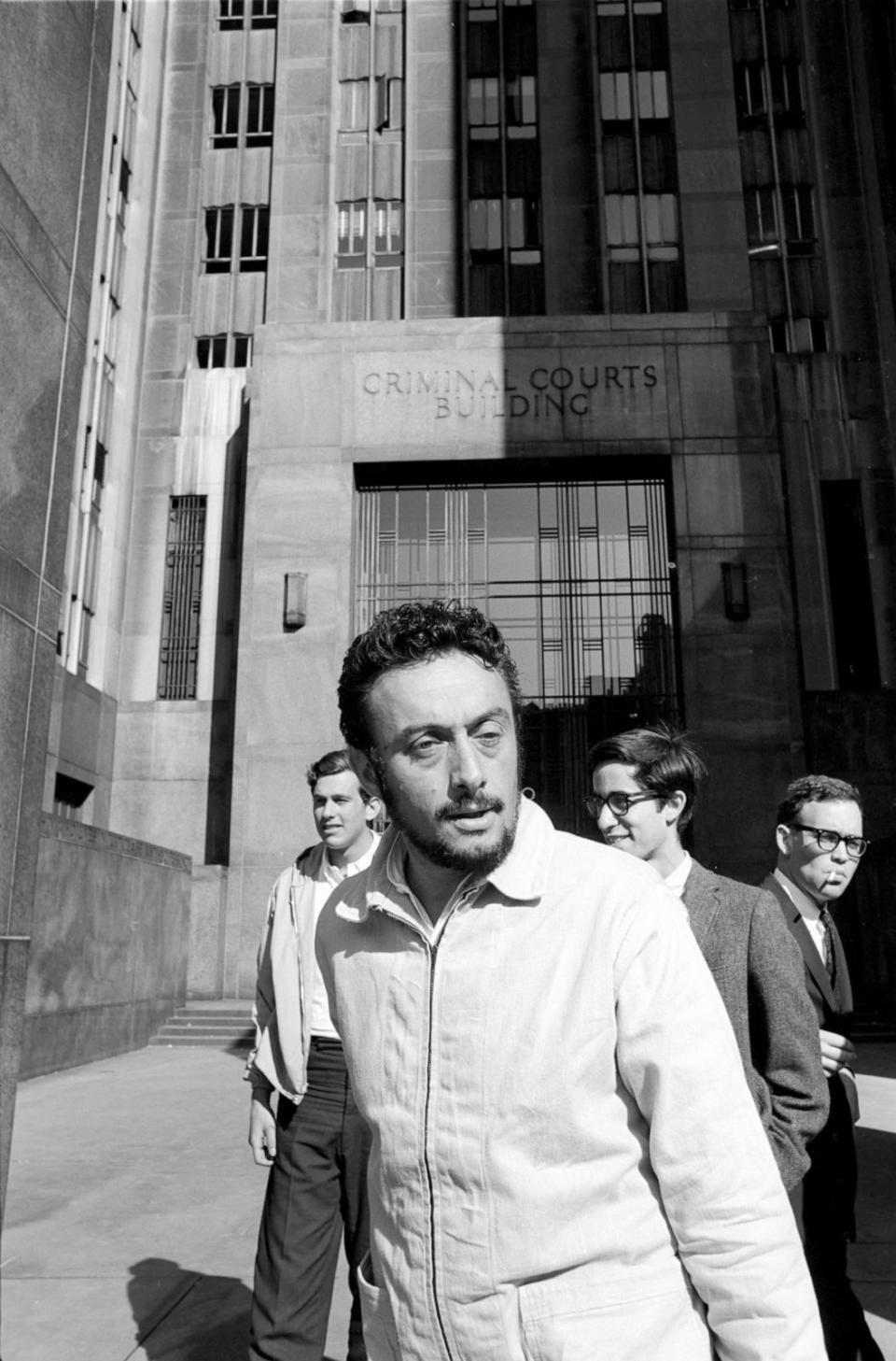 PHOTO: In this June 17, 1964, file photo, stand-up comedian Lenny Bruce walks out of the building at his obscenity trial in New York. (Ben Martin/Getty Images, FILE)
