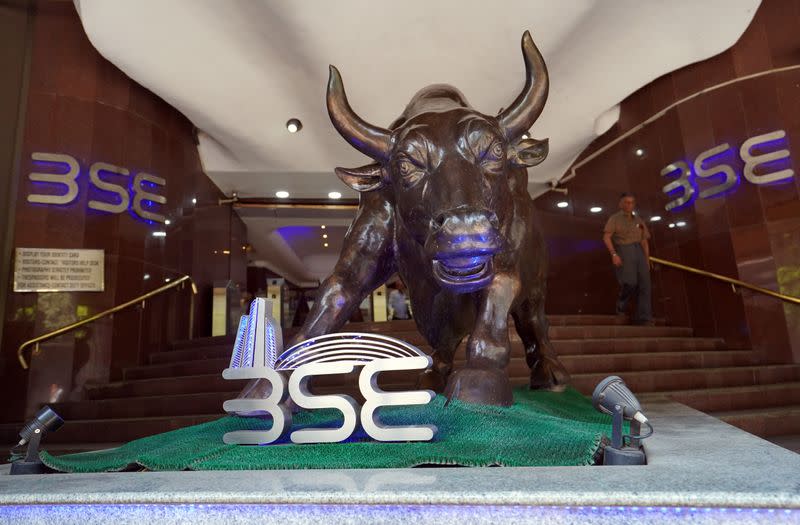 A man walks out of the Bombay Stock Exchange building in Mumbai, India,