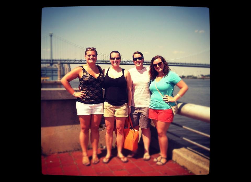 From right to left: Stephanie (far right) with girlfriend Jackie (left of me) along with best friends Erika and Katie at Philadelphia Pride in front of the Ben Franklin Bridge at Penns Landing.