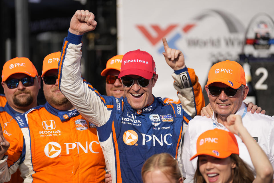 Scott Dixon celebrates after winning an IndyCar auto race at World Wide Technology Raceway, Sunday, Aug. 27, 2023, in Madison, Ill. (AP Photo/Jeff Roberson)