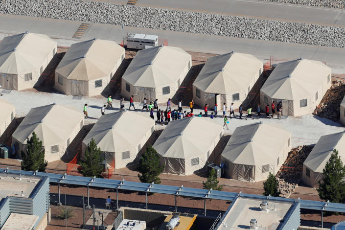 <span class="s1">Immigrant children, many of whom have been separated from their parents, are being housed in this compound next to the Mexico border in Tornillo, Texas, in June. (Photo: Mike Blake/Reuters)</span>