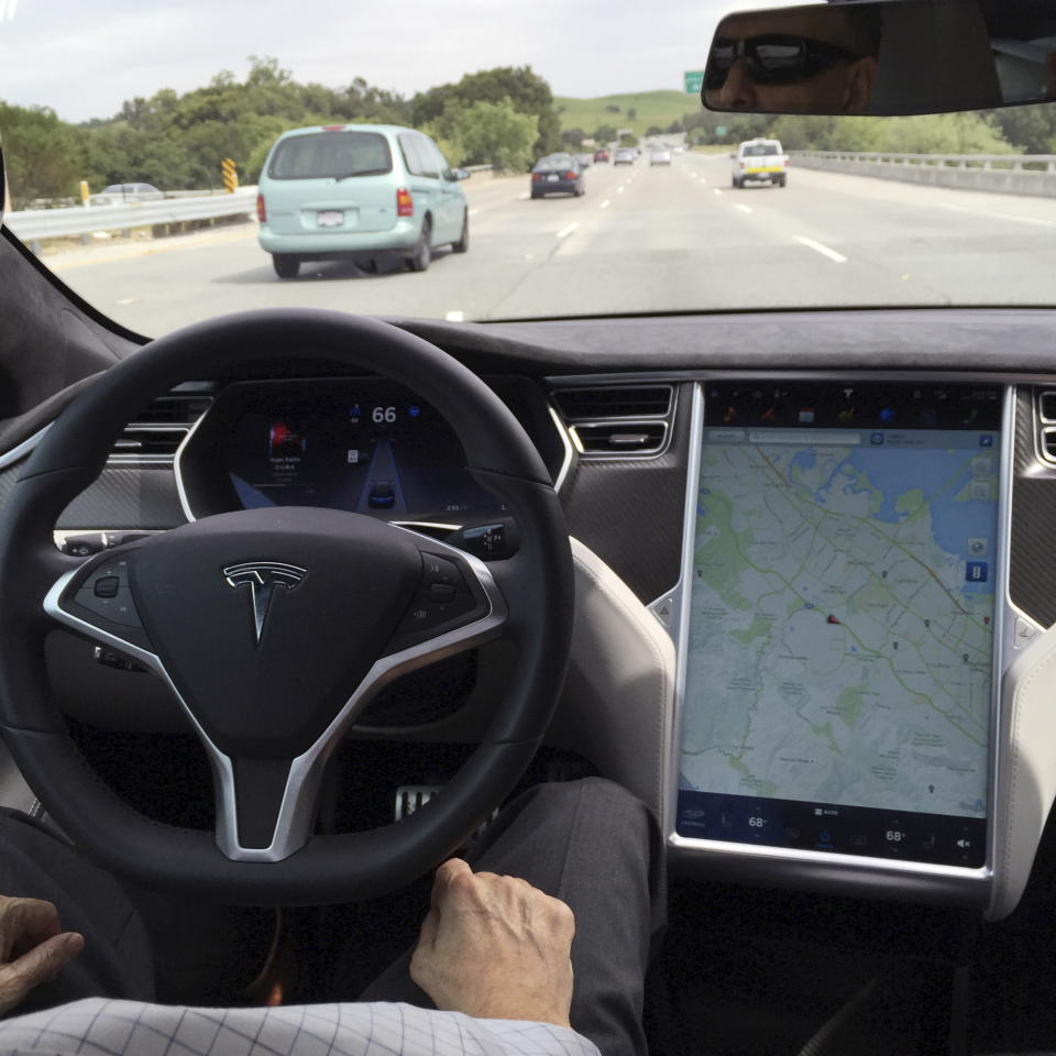 The interior of a Tesla Model S is shown in autopilot mode in San Francisco, California, U.S., April 7, 2016.   REUTERS/Alexandria Sage/File Photo