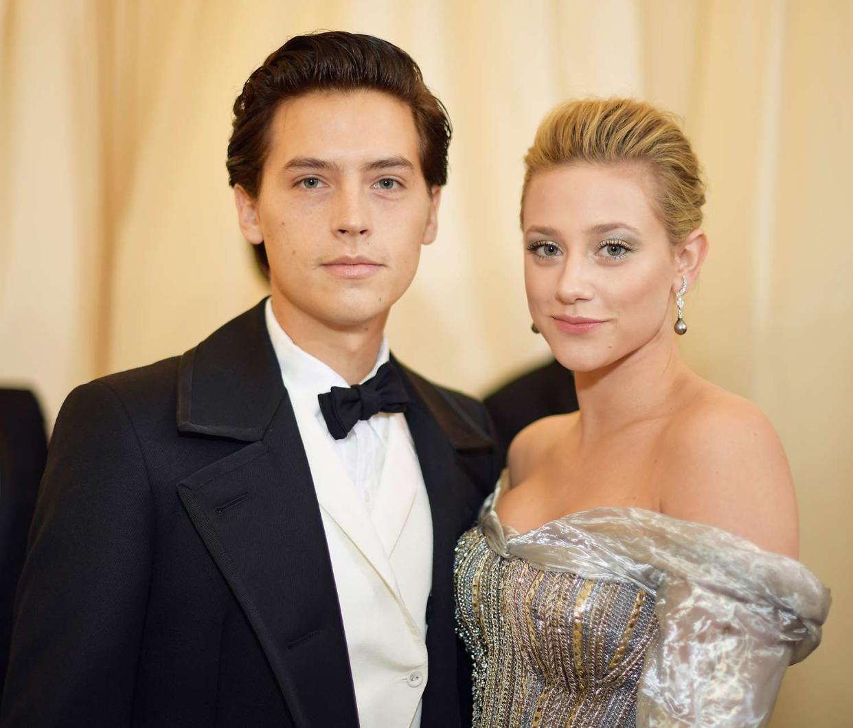 Cole Sprouse and Lili Reinhart attend the Heavenly Bodies: Fashion & The Catholic Imagination Costume Institute Gala at The Metropolitan Museum of Art on May 7, 2018 in New York City