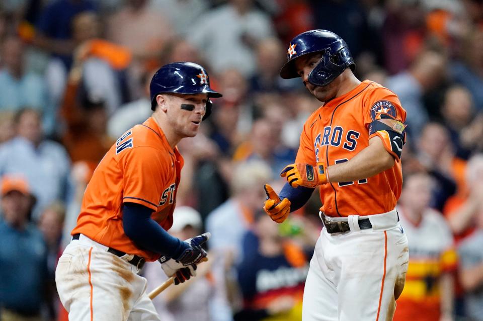 Alex Bregman and Jose Altuve celebrate during Game 2.