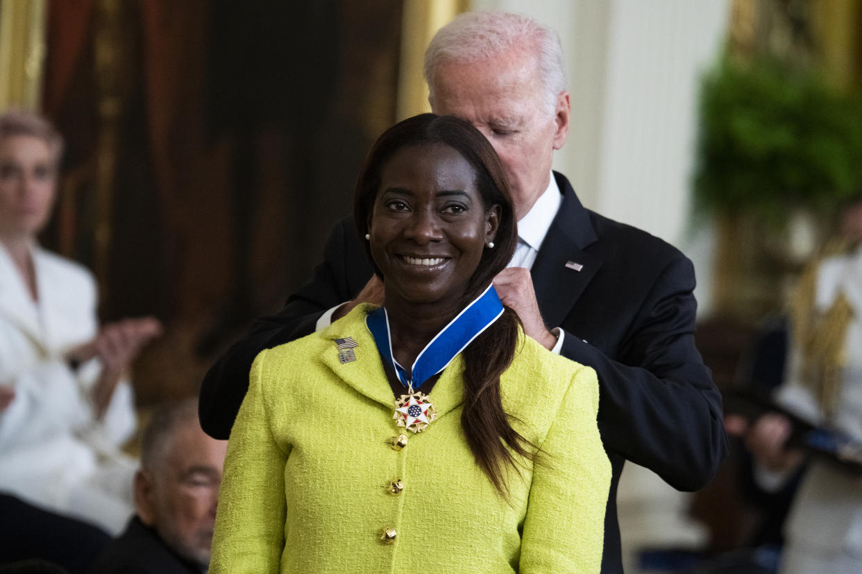 President Joe Biden presents the Presidential Medal of Freedom, the nation's highest civilian honor, to nurse Sandra Lindsay, during a ceremony at the White House on  July 7, 2022.  (Tom Williams / CQ Roll Call via AP Images file)