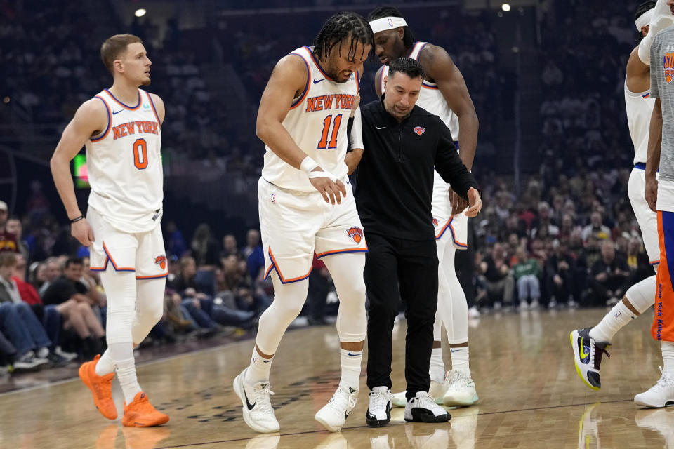 Jalen Brunson landed awkwardly after taking a shot on the Knicks' first possession of the game on Sunday afternoon in Cleveland.