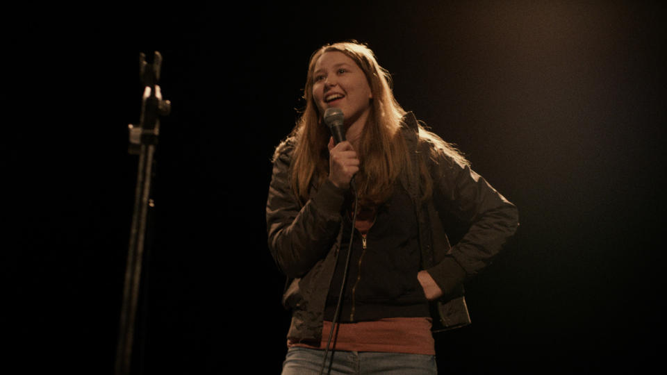 Liv Hill turns her hand to stand-up comedy in gritty British drama 'Jellyfish'. (Credit: Republic Film Distribution)