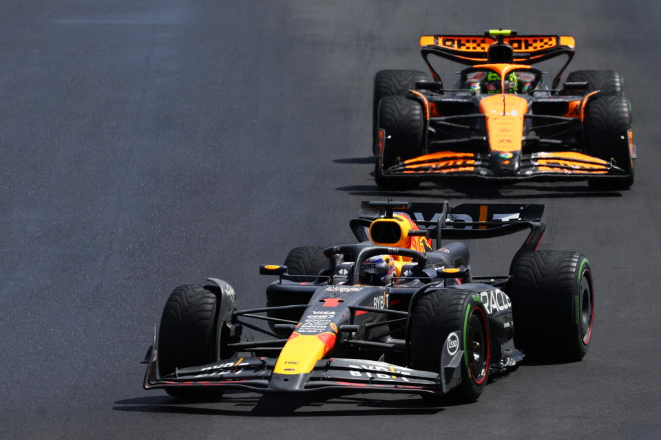 MONTREAL, QUEBEC - JUNE 09: Max Verstappen of the Netherlands driving the (1) Oracle Red Bull Racing RB20 leads Lando Norris of Great Britain driving the (4) McLaren MCL38 Mercedes on track during the F1 Grand Prix of Canada at Circuit Gilles Villeneuve on June 09, 2024 in Montreal, Quebec. (Photo by Clive Rose/Getty Images)