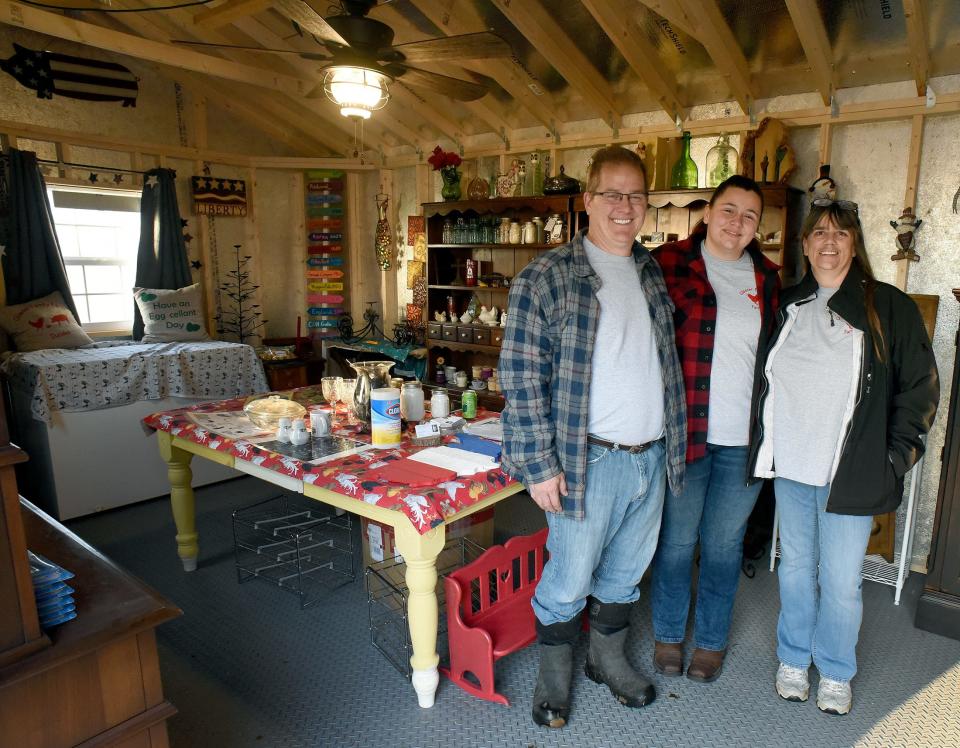 Bill Glaeser, his daughter, Ashely Drew, and wife, Kay, have opened up a store on Irish Road in Dundee, offering a variety of items.