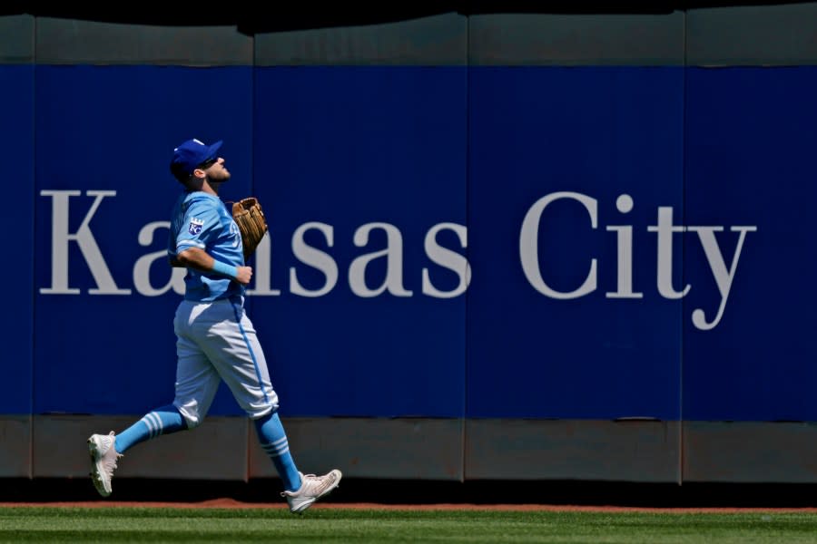 Kansas City Royals center fielder <a class="link " href="https://sports.yahoo.com/mlb/players/10873/" data-i13n="sec:content-canvas;subsec:anchor_text;elm:context_link" data-ylk="slk:Garrett Hampson;sec:content-canvas;subsec:anchor_text;elm:context_link;itc:0">Garrett Hampson</a> chases after a solo home run hit by Baltimore Orioles’ Colton Cowser during the third inning of a baseball game Sunday, April 21, 2024, in Kansas City, Mo. (AP Photo/Charlie Riedel)