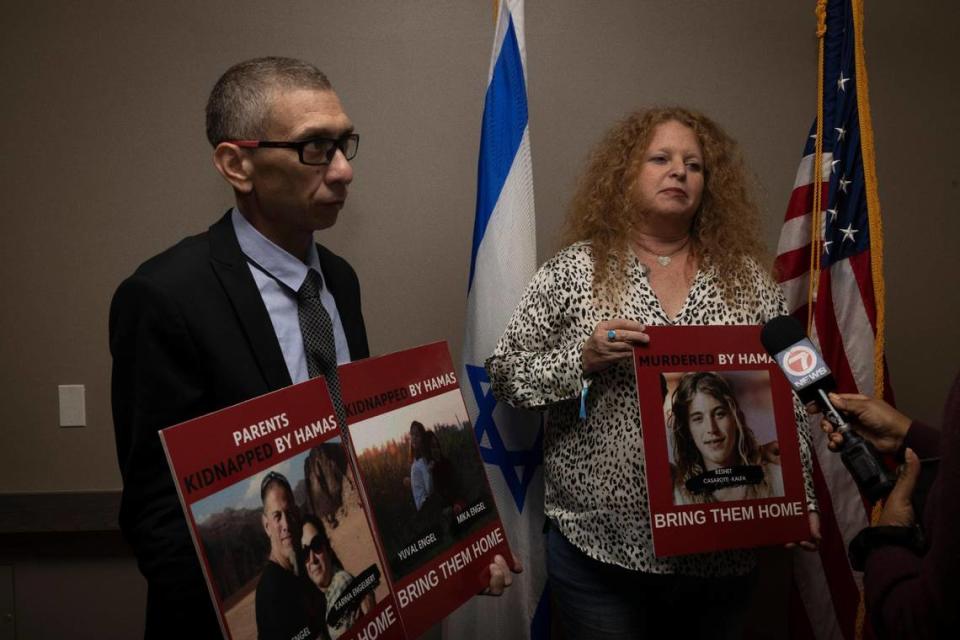Diego Engelbert, left, whose family members are hostages of Hamas and Natalia Casarotti, whose son was killed by Hamas, speak to the media during the North American Mayors Summit Against Antisemitism on Wednesday, Nov. 15, 2023, at the W Hotel in Fort Lauderdale.