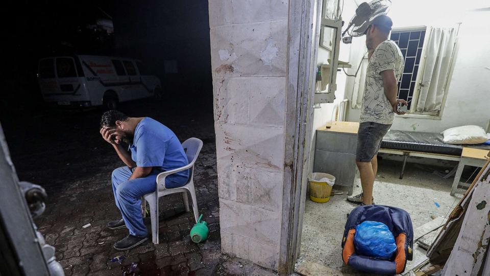 PHOTO: A doctor at the scene of Al Ahli hospital after an air strike in Gaza City, Oct. 17, 2023. (Mohammed Saber/EPA via Shutterstock)